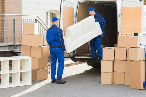 Team member securing items inside a moving van