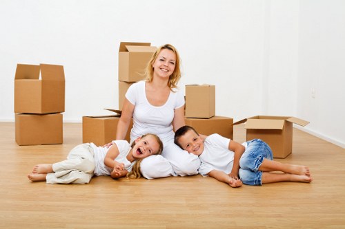 Careful wrapping of fragile items during a Kennington move