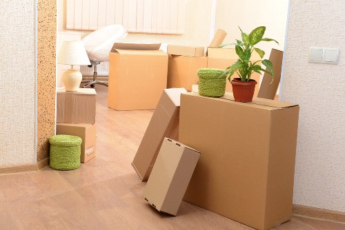 Unpacking boxes in a new Kennington home